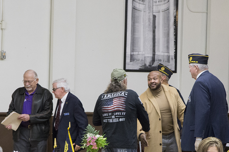 Indianapolis Metropolitan Police Department (IMPD) North District Commander Michael Wolley being greeted at the dinner.