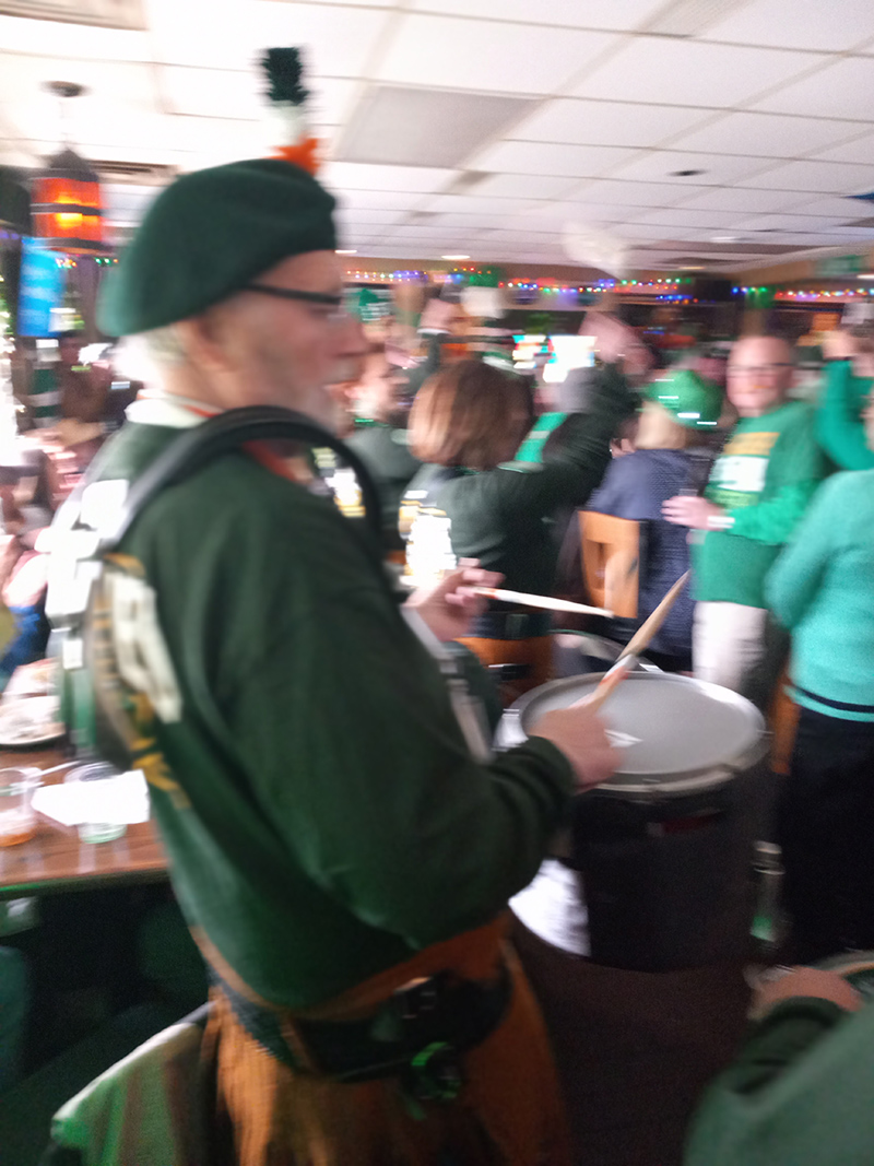 An action shot of the pipe band