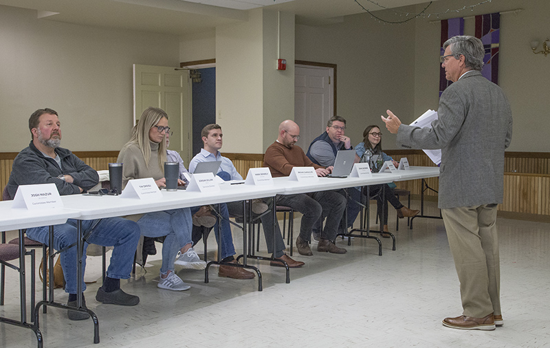 Audiochuck presenting before the board