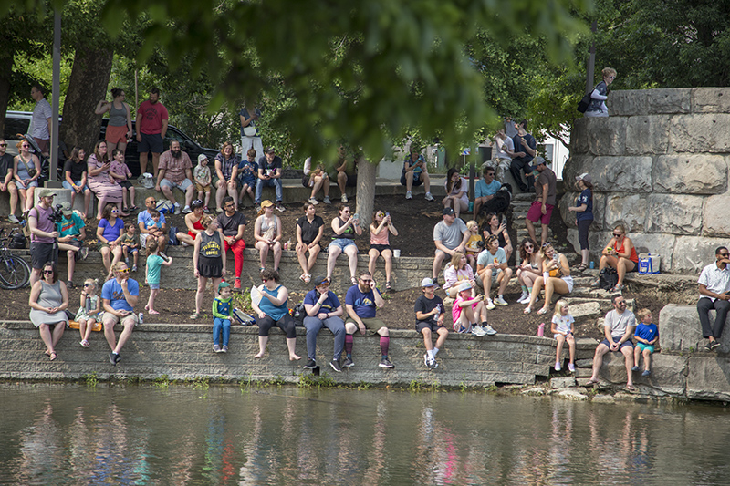 Crowds gathering on the banks of the Central Canal