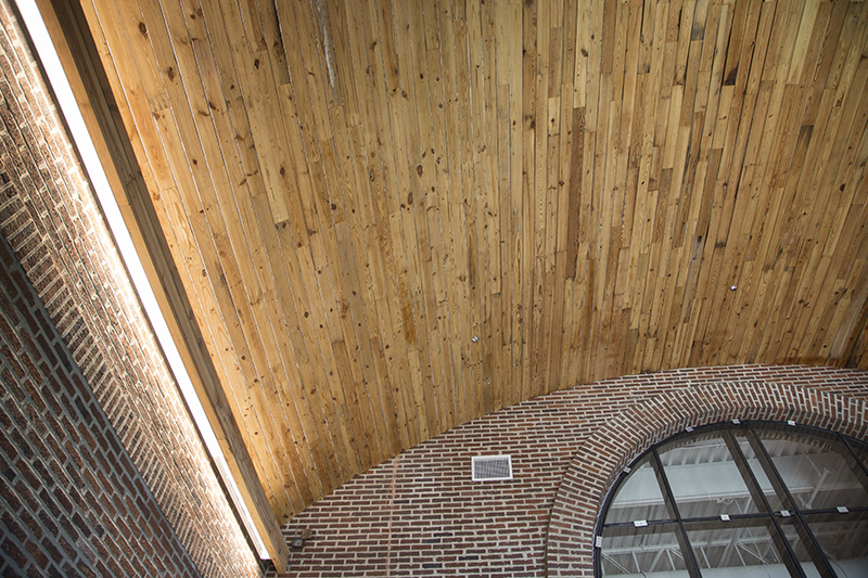 Reclaimed wood lines the ceiling