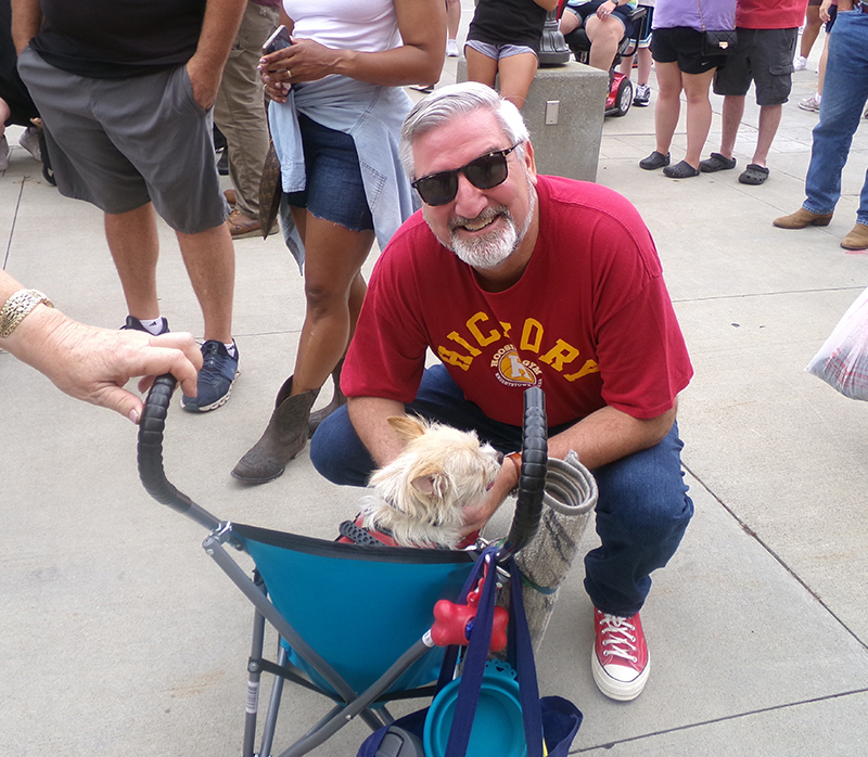 Governor Holcomb visits with Frog's service dog Benji