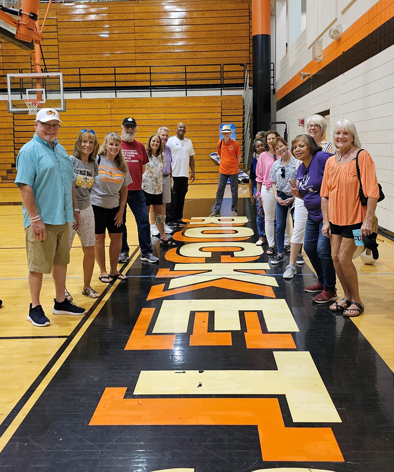 Touring the gym at the school