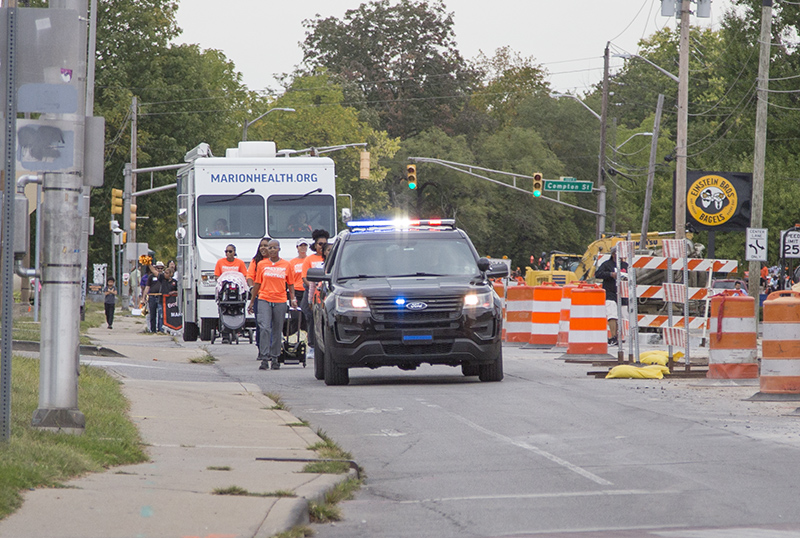 The parade coming down Broad Ripple Avenue in front of McDonald's