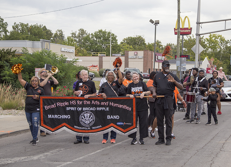 Victor Wenning (Class of 1951) at the center of the banner starting the parade