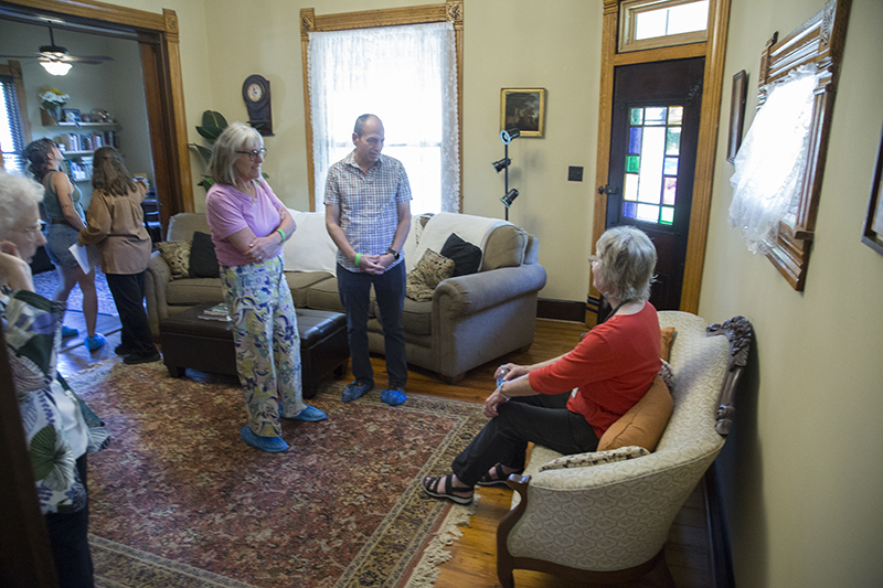 Previous owner of the Flower House and daughter of Karl Theilig, Helen Landsem, seated, came back to Indy for the tour