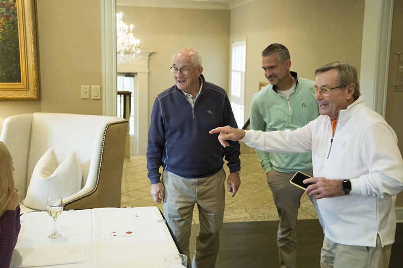 Jack Hogan (1963) shows Jon Constable (1966) and Jon's son Mike where the sign-in table is