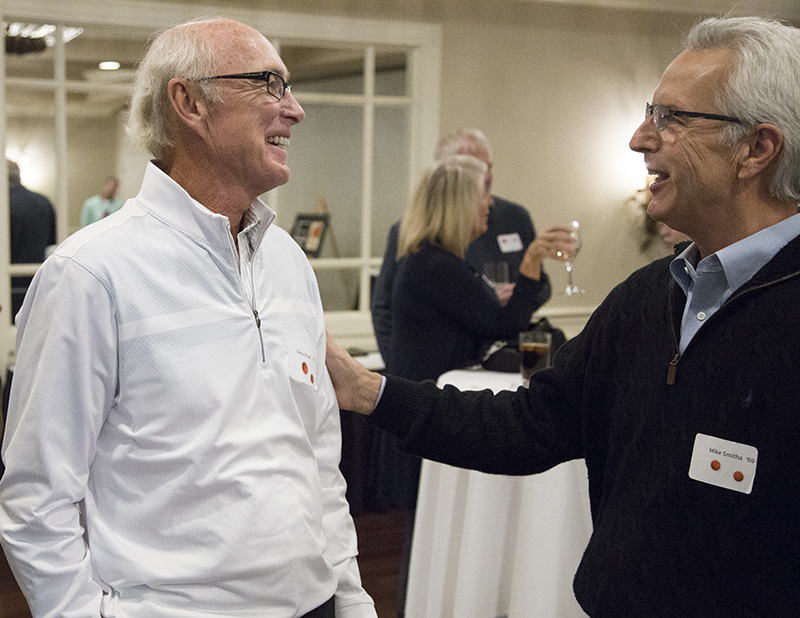 Steve Shuel (1970) and Mike Smitha (1969) reconnect. Gene Ring's daughter Cheryl is in the back.