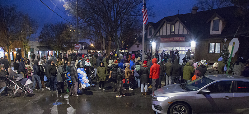 Gathering at the fire station for the tree lighting