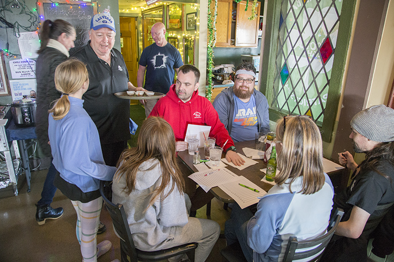 Pawn Shop co-owner Robert Diemer hands out a round of samples