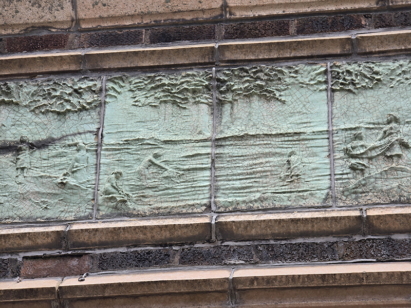 Detailed tiles above the laundry windows