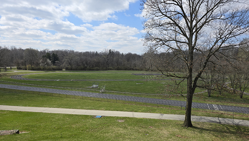 The grounds on the south side of the property with the track.