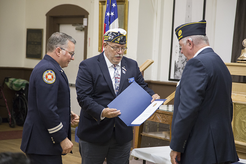 Robert Rowley, 11th District Commander and Mark Gullion, Past Commander Indiana, present the award to Captain Ronald Kautsky