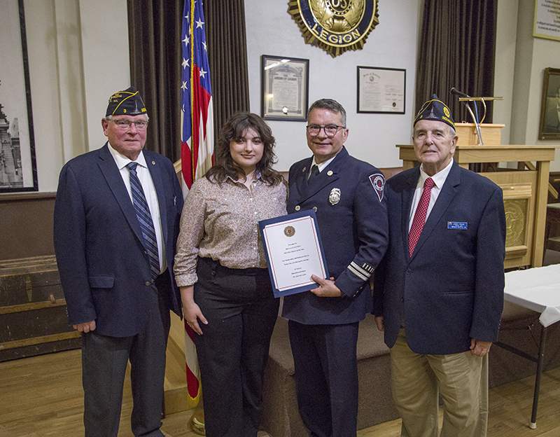 Captain Ronald Kautsky posed with his daughter and Dan Cunningham and Jerry Traub from Post #3