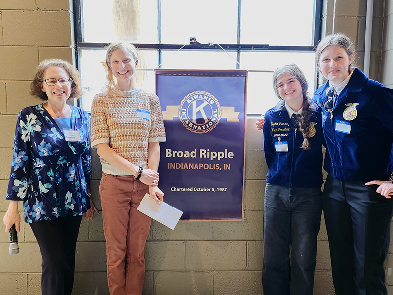 Alison Stilwell, Kiwanis club president, with Karen Puffer from PPHS, plus students and FFA members Victoria and Sophie