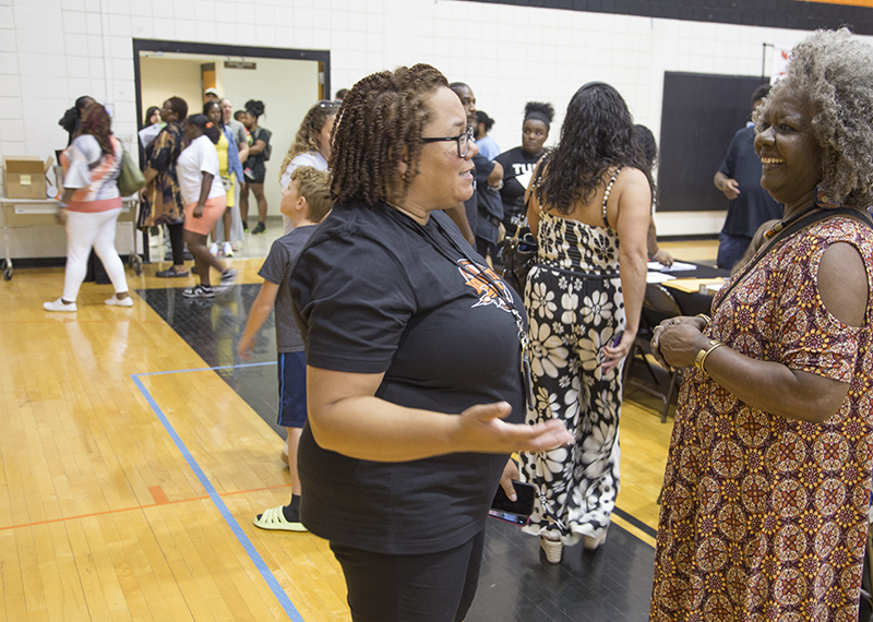 Principal, Tiffany Robinson (center)