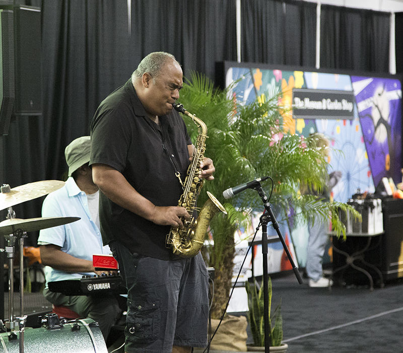 Rob Dixon performing in the Harvest Pavilion