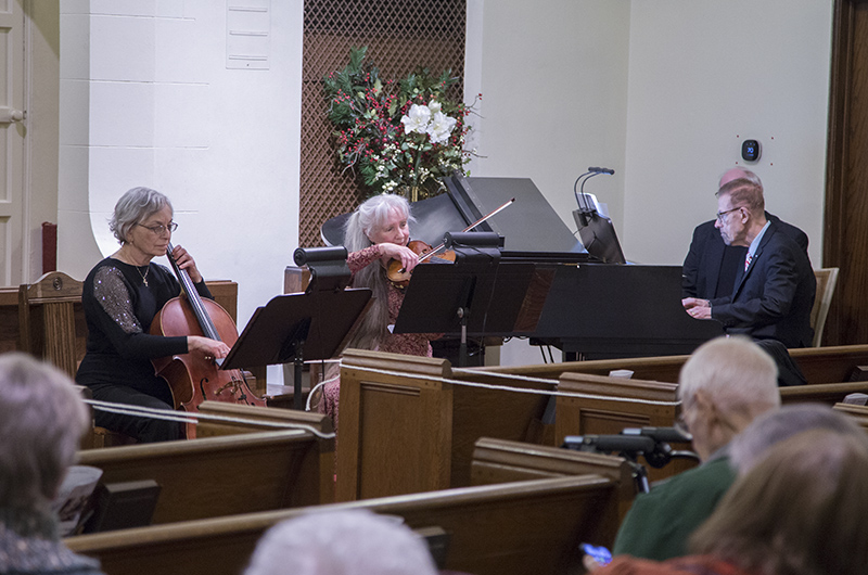 Cellist Polina Umansky, violinist Lynn Denne, organist Dave Graf, and organist Greg Gibson behind Dave.
