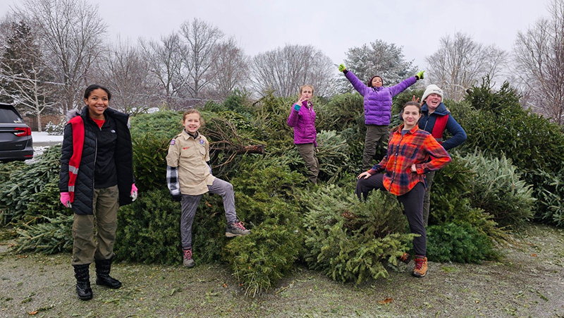 BSA Troop 171 members on their Christmas tree recycling day in 2023