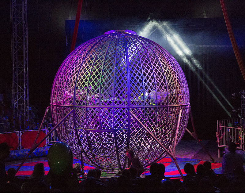 There are two motorcycles spinning inside this ball. Later there were three!
