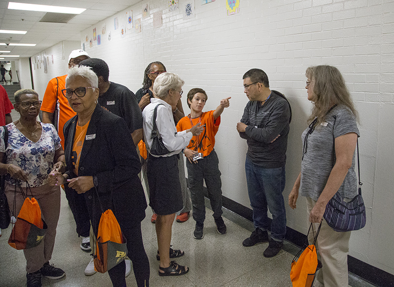 The reunion attendees broke into groups for the tours