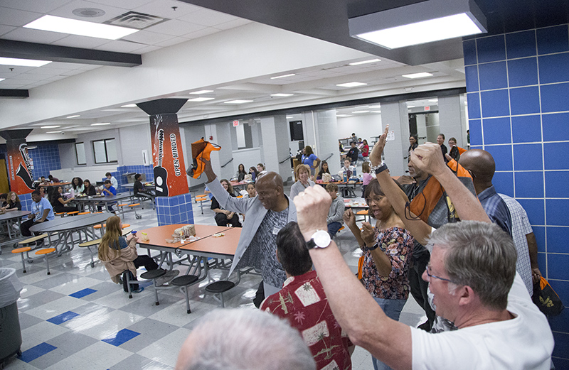 The middle-schoolers were a bit surprised when the alumni came in to the cafeteria and started the BRHS Chant - Rip-ple Rock-ets [clap clap clap clap clap] Rip-ple Rock-ets [clap clap clap clap clap]