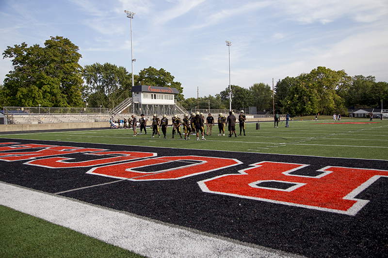 The CAHS Tigers practicing on the field
