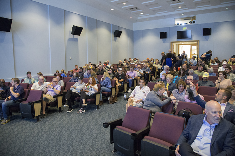 The seats were starting to fill up before the meeting