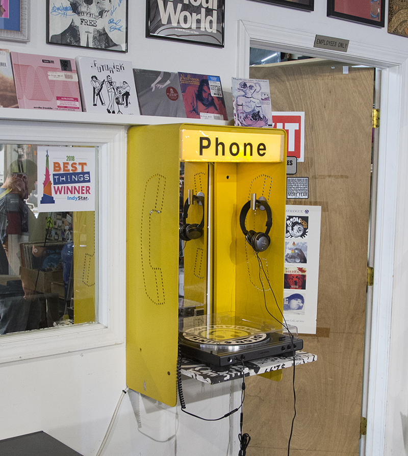 A phone booth listening station