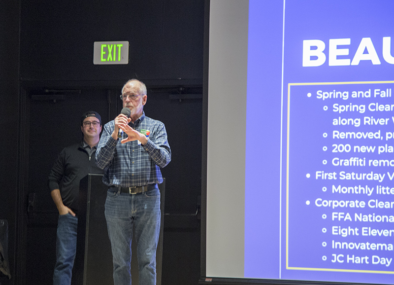 Farmers Market and Beautification committee member Mark Demerly answers questions