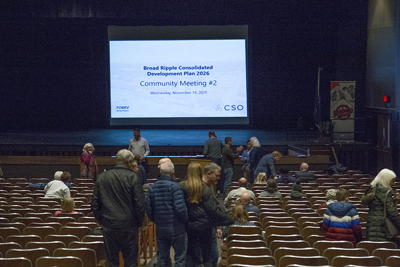 People arriving for the meeting in the BRMS auditorium