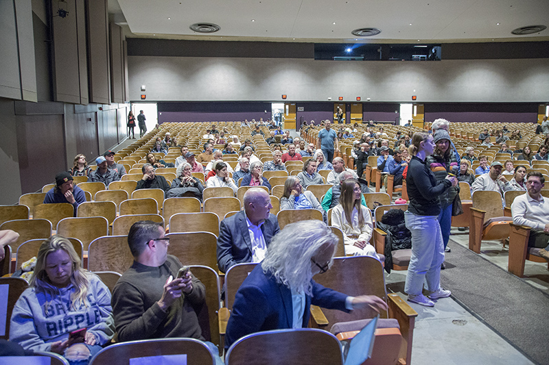 People lined up for questions and comments