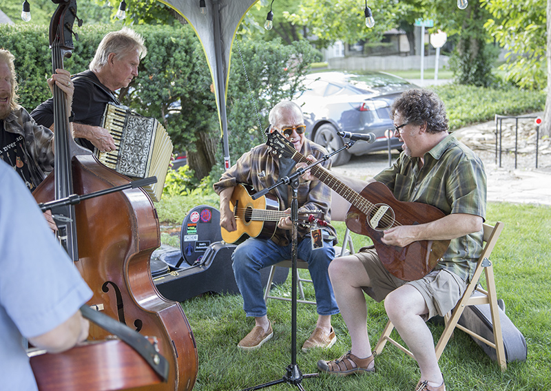 Gary Bole on accordion, Keith Carey on guitar, John Martin on guitar