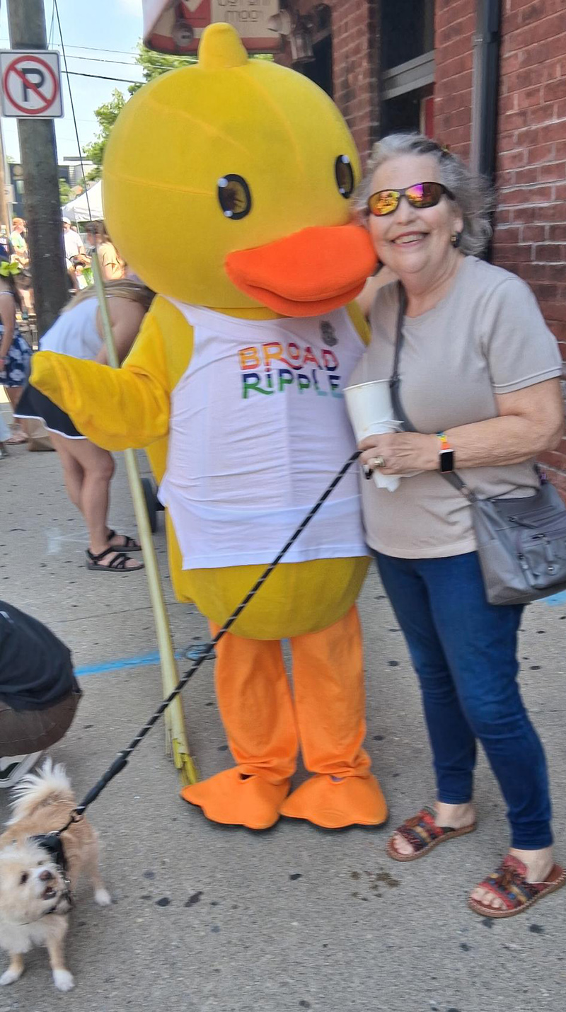 Peggy and Benji with the Duck Mascot