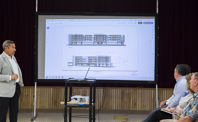 Misha Rabinowitch showing the new elevations