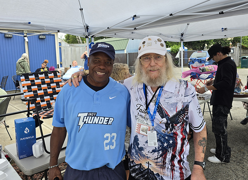 Darnell Booker, coach for Indy Thunder, and The Gazette's Frog.