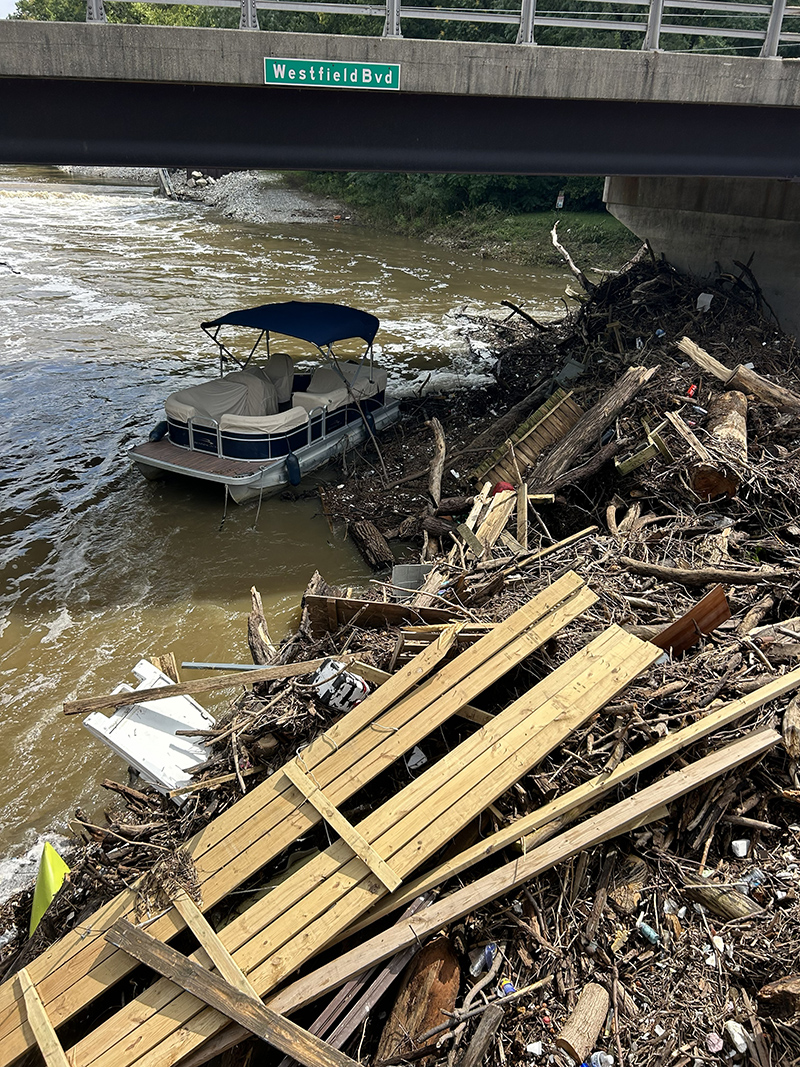 A stray pontoon boat ended up at the Monon bridge at 73rd.